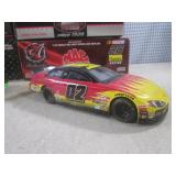 (CS) 2 Diecast Metal Race Cars 1:24...