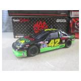 (CS) 2 Diecast Metal Race Cars 1:24...