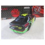 (CS) 2 Diecast Metal Race Cars 1:24...