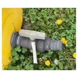 1500 Gallon Yellow Poly Tank, holds water, has some fluff on bottom