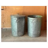 Two Galvanized Metal Trash Cans with Lids