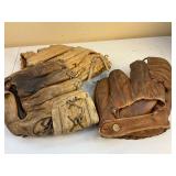 Three Leather Baseball Gloves