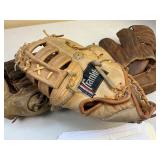 Three Leather Baseball Gloves