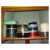 Collection of decorative tins, faux...