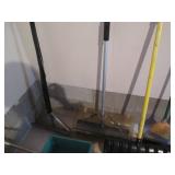 Lot of shovels, brooms, mop and a y...