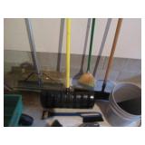 Lot of shovels, brooms, mop and a y...
