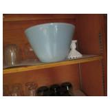 Cupboard full of Hamms Coca Cola an...