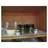 Cupboard full of Hamms Coca Cola an...