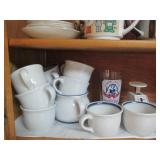Cupboard of cups, mugs, Pyrex, and ...