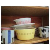 Cupboard of cups, mugs, Pyrex, and ...