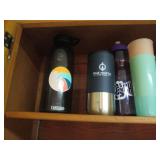 Cupboard of cups, mugs, Pyrex, and ...