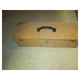 Wood box filled with new knives and...