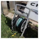 Garden hose caddy with hoses