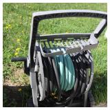 Garden hose caddy with hoses