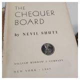 The book Chequer Board + other vintage books.