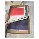 Craft Supplies with Yarn, Patterns, and Cross-Stitch Pillow