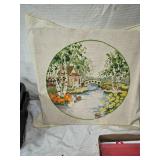 Craft Supplies with Yarn, Patterns, and Cross-Stitch Pillow