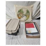 Craft Supplies with Yarn, Patterns, and Cross-Stitch Pillow