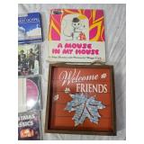 CDs, Book and Decorative Sign