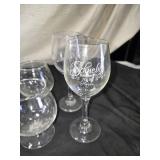 Elegant Crystal Glassware including Wine and Champagne Glasses, Decanter, and Ice Bucket