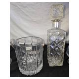 Elegant Crystal Glassware including Wine and Champagne Glasses, Decanter, and Ice Bucket