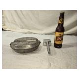 Collection of Vintage Metal Items: Beer Bottle Flashlight, Garlic Press, and Mess Kit Marked 1942