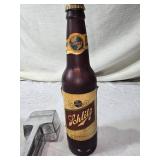 Collection of Vintage Metal Items: Beer Bottle Flashlight, Garlic Press, and Mess Kit Marked 1942