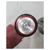 Collection of Vintage Metal Items: Beer Bottle Flashlight, Garlic Press, and Mess Kit Marked 1942