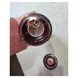 Collection of Vintage Metal Items: Beer Bottle Flashlight, Garlic Press, and Mess Kit Marked 1942