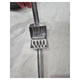 Collection of Vintage Metal Items: Beer Bottle Flashlight, Garlic Press, and Mess Kit Marked 1942