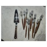 Variety of Kitchenware with Tupperware, Utensils, Veggie Decor, Fruit Decor, and Glass Olive Oil Dispensers