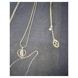 Assorted Jewelry with Necklaces, Bracelets, and Tokens