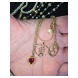 Assorted Jewelry with Necklaces, Bracelets, and Tokens