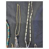 Vintage Jewelry with Necklaces, Bracelets, and Coins