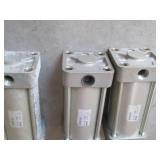 (4) SMC pneumatic air cylinders...