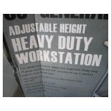 Metal framed portable workbench wit...