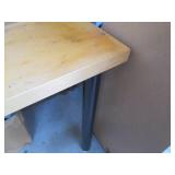 Wood top table with metal tubular l...