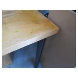Wood top table with metal tubular l...