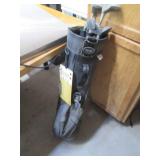 Golf bag containing misc golf clubs...