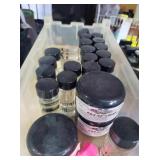 Lot of clamps and mineral oil bottles