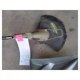 Earthworks electric weed whip, no charger and a shovel