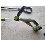 Earthworks electric weed whip, no charger and a shovel