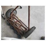Fan, antique push mower, step ladder