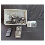 Collection of Office and Media Equipment Including DVD Player, Phones, and More