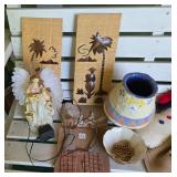 Assorted Home Decor Items with Scenic Wall Art and Holiday Themes