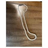 Collection of Assorted Necklaces and Bas-Relief Plaque