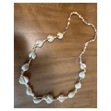 Collection of Assorted Necklaces and Bas-Relief Plaque