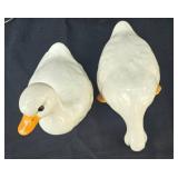 Collection of Home Decor Items Including Floral Arrangements and Ceramic Pieces