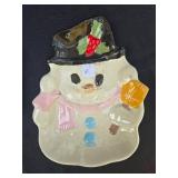 Collection of Home Decor Items Including Floral Arrangements and Ceramic Pieces