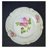 Collection of Home Decor Items Including Floral Arrangements and Ceramic Pieces
